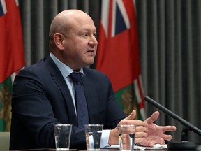 Dr. Brent Roussin, chief provincial public health officer, speaks during a press briefing at the Manitoba Legislative Building in Winnipeg on Tuesday, Nov. 24, 2020.