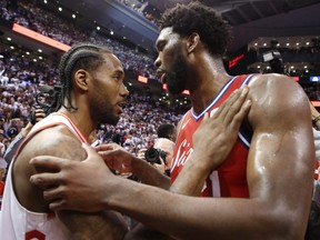 In an alternate ending to the 2019 NBA playoffs suggested by columnist Scott Stinson, Kawhi Leonard of the Raptors is consoled by Joel Embiid of the Philadelphia 76ers after Toronto was knocked out in the second round.
