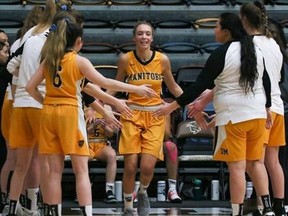 University of Manitoba Bisons player Keziah Brothers (centre), 22, was meant to be playing in her fifth and final season with the University of Manitoba Bisons basketball team. Now as she nears graduation, she is unsure if she will take more courses next fall to complete her fifth year of athletic eligibility.