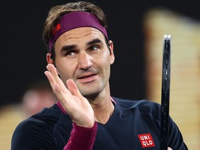 Switzerland's Roger Federer reacts after winning a match against Serbia's Filip Krajinovic at the 2020 Australian Open.
