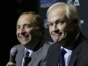 NHL commissioner Gary Bettman (left) and NHLPA head Don Fehr have decided to set aside their differences over escrow and deferred payments to concentrate instead on having a new season.
