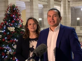 NDP leader Wab Kinew and his wife Dr. Lisa Kinew address Manitobans, urging them not to gather for Christmas and to get a vaccination when it is their turn at the Manitoba Legislature in Winnipeg on Tuesday, Dec. 22, 2020. Josh Aldrich/Winnipeg sun