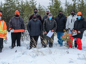 (Left to right): Ernest Merasty (Chepil Project Leader), Marcel ‘Moody’ Colomb (Youth Participant), Sarah Copapay (MCFN Employee Training Manager), Michael Raess (Alamos Gold Manager, Environment and Community Relations), Don McCollum (MCFN Councillor), Gordon Halkett (Cabin Contractor), Douglas Hart (MCFN Housing Manager), Cory Hart (MCFN Councillor) and Eagle Colomb (Youth Participant). Supplied photo.