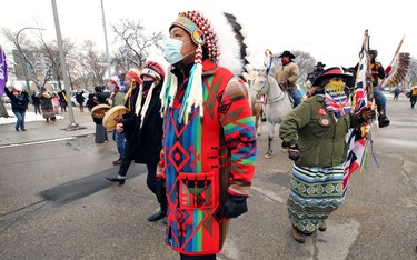 Assembly of First Nations regional chief Kevin Hart (centre) leads a ceremonial horse spirit ride to the Manitoba Legislative building in Winnipeg on Wed., Oct. 21, 2020, where Indigenous leaders and others expressed solidarity with Mi'kmaq fishers in Nova Scotia. Kevin King/Winnipeg Sun/Postmedia Network