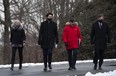 (Left to right) Minister of Infrastructure and Communities Catherine McKenna, Prime Minister Justin Trudeau, Minister of Canadian Heritage Steven Guilbeault and Minister of Environment and Climate Change Jonathan Wilkinson walk to make an announcement on the government's updated climate change plan in the Dominion Arboretum in Ottawa, on Friday, Dec. 11, 2020.