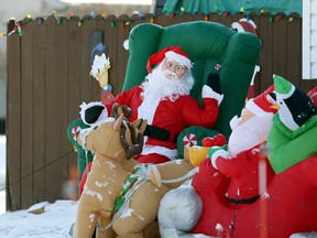 A Christmas yard display on Betsworth Avenue in the Charleswood area of Winnipeg on Sunday, Dec. 13, 2020.