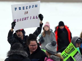 About 100 people attended The Reason for the Season, an event at the Manitoba Legislative Building in Winnipeg on Sunday, Dec. 20, 2020 featuring Christmas carols, speeches and a message from Church of God (Restoration) minister Tobias Tissen, few masks and little social distancing. Police observed from a distance. It isn't believed any tickets were handed out on site.