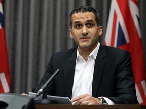 Dr. Jazz Atwal, Manitoba's acting deputy chief public health officer, speaks during a COVID-19 briefing at the Manitoba Legislative Building in Winnipeg on Monday.