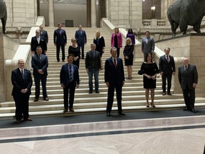 Premier Brian Pallister (front, centre) introduced his new cabinet at the Manitoba Legislature on Tuesday.
