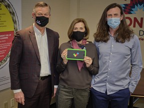 (Left to right) Frontier School Division chief superintendent Reg Klassen, Susan Millican and Timothy Millican. Four hundred and fifty OneTap tablets were donated to the Frontier School Division by Timothy Millican and his mother, Susan Millican who wanted to help children in isolated and remote communities that do not have access to technology or reliable internet.