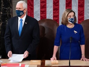 U.S. Vice President Mike Pence presides over a joint session of Congress with Speaker of the House Nancy Pelosi (D-CA) on January 6, 2021 in Washington, DC.