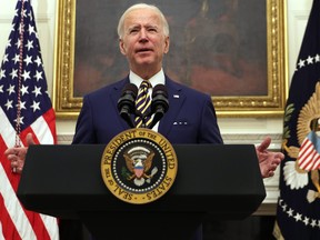 U.S. President Joe Biden speaks during an event on economic crisis in the State Dining Room of the White House Jan. 22, 2021 in Washington, D.C.