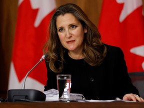 Deputy Prime Minister and Minister of Finance Chrystia Freeland speaks to news media before unveiling her first fiscal update, the Fall Economic Statement 2020, in Ottawa, Nov. 30, 2020.