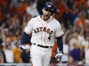 Centre fielder George Springer is coming to Toronto after signing a huge contract with the Blue Jays. AP PHOTO