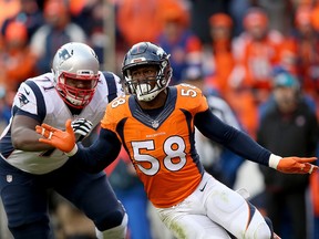 Von Miller of the Denver Broncos rushes against Cameron Fleming of the New England Patriots at Sports Authority Field at Mile High on January 24, 2016 in Denver.