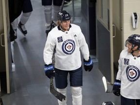 Patrik Laine (left) and Nikolaj Ehlers (right) in conversation during Winnipeg Jets training camp at Bell MTS Iceplex in Winnipeg on Tuesday, Jan. 5, 2021.