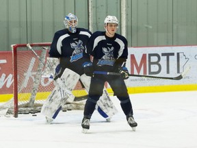 Winnipeg Jets prospect Cole Perfetti screens goalie Mikhail Berdin during Manitoba Moose training camp on Monday.