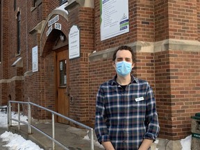 Josh Ward, Community Facilitator for St. Matthews Maryland Community Ministry of 1JustCity stands outside of the St. Matthews Maryland Community Ministry in Winnipeg's West End on Saturday, Jan. 9, 2021. 1JustCity's West End Site St Matthews Maryland Community Ministry announced on Saturday that it is opening its doors on the weekend for the first time in its 40 year history of serving the community. "We thought it was super important to open on weekends this year because so much of what our guests rely on to stay warm or use washrooms are closed," said Ward.