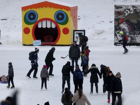 People skate on the Assiniboine River, at The Forks, near a warming hut. Saturday, Jan. 30, 2021.