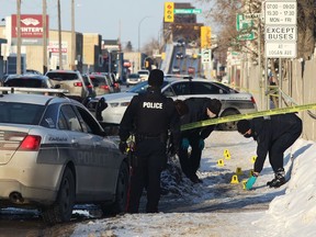 Winnipeg police investigate a suspicious death on Bannatyne Avenue at Arlington Street in Winnipeg on Sunday.