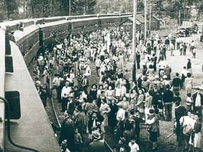 Photograph shows Japanese-Canadians in Slocan City, B.C. waiting for internment in detention camps during the Second World War..
