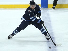 Jets defenceman Neal Pionk (pictured) came to the Jets in a 2019 trade that sent blue-line stud Jacob Trouba to the New York Rangers.