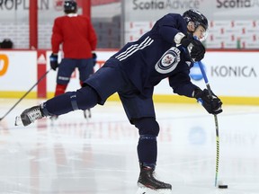 Winnipeg Jets forward Cole Perfetti shoots during an optional practice at Bell MTS Place in Winnipeg on Wed., Feb. 3, 2021. Kevin King/Winnipeg Sun/Postmedia Network