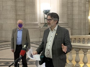 Manitoba Liberal Leader Dougald Lamont addresses the media while Liberal Health Critic and River Heights MLA Dr. Jon Gerrard listens on during a press conference at the Manitoba Legislature in Winnipeg on Sunday. The Manitoba Liberal Caucus released phase two of their report on individuals experiencing homelessness Sunday, detailing the failures of successive NDP and PC governments to address poverty and housing in Winnipeg.
