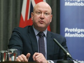Dr. Brent Roussin, chief provincial public health officer, speaks during a press conference announcing the easing of some COVID-19 restrictions, at the Manitoba Legislative Building in Winnipeg, on Tuesday.
