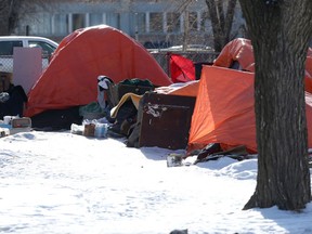 A homeless camp in Winnipeg.  This cluster of tents is several blocks away from the scene of an explosion and fire that claimed the life of a person at a different homeless camp.  Wednesday, February 17, 2/2021.Winnipeg Sun/Chris Procaylo/stf