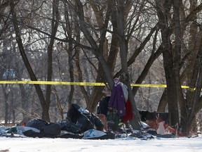 A homeless encampment near the Red River off Higgins Avenue in Winnipeg on Tues., Feb. 16, 2021. One person is dead after an explosion believed to be the result of ignited aerosols. Kevin King/Winnipeg Sun/Postmedia Network