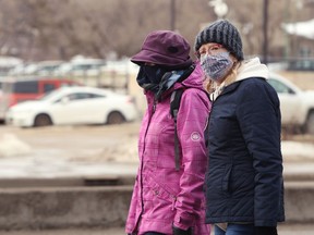 Women walk on Osborne Street in Winnipeg on Tuesday, Feb. 23, 2021