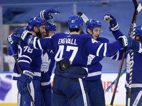Toronto Maple Leafs forward Ilya Mikheyev (right) celebrates his third-period goal against the Jets on Thursday night.