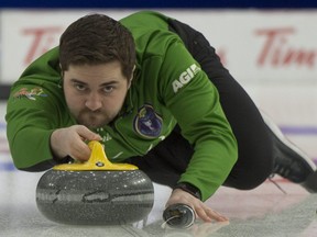 Team Saskatchewan skip Matt Dunstone delivers his stone during draw 5 game against N.L. at the Tim Hortons Brier in Calgary on Sunday, March 7, 2021.
