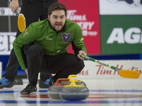 Team Saskatchewan skip Matt Dunstone, shouts to his front end during draw 5 against NL. at the Tim Hortons Brier in Calgary on Sunday, March 7, 2021.