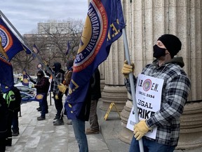 IBEW members rally on the front steps of the Manitoba Legislature on Wednesday, March 24, 2021.
Josh Aldrich/Winnipeg Sun