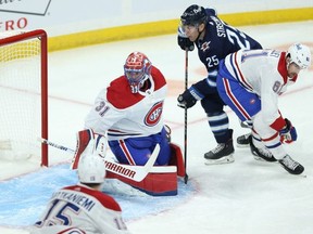 Winnipeg Jets forward Paul Stastny  is unable to get to a loose puck behind Montreal Canadiens goaltender Carey Price last night. Kevin King/Winnipeg Sun