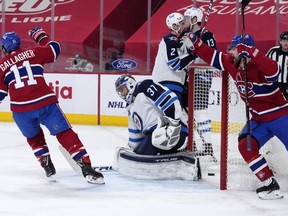 Montreal Canadiens forward Brendan Gallagher reacts after scoring a goal against Winnipeg Jets goalie Connor Hellebuyck at the Bell Centre. USA TODAY