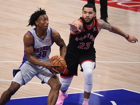 Detroit Pistons guard Saben Lee (38) drives to the basket against Toronto Raptors guard Fred VanVleet (23) at Little Caesars Arena.