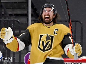 LAS VEGAS, NEVADA - MARCH 22: Mark Stone #61 of the Vegas Golden Knights reacts after scoring the first of his two goals in the third period against the St. Louis Blues during their game at T-Mobile Arena on March 22, 2021 in Las Vegas, Nevada. The Golden Knights defeated the Blues 5-1. (Photo by Ethan Miller/Getty Images)