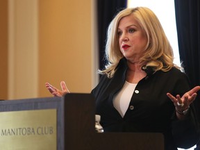 Leigh Cunningham, the lead plaintiff in a class action lawsuit against RBC Dominion Securities, speaks during a press conference at the Manitoba Club in Winnipeg on Thurs., March 4, 2021. Kevin King/Winnipeg Sun/Postmedia Network