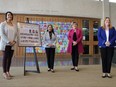 (Left to right) Coun. Vivian Santos (Point Douglas), Coun. Devi Sharma (Old Kildonan), Coun. Janice Lukes (Waverley West) and Coun. Cindy Gilroy (Daniel McIntyre) gather to celebrate the unveiling of a commemorative plaque honouring women in Winnipeg civic politics, on Monday.