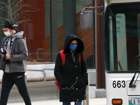 People wearing masks in downtown Winnipeg on Monday, March 15, 2021.