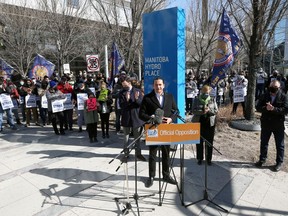 A look at the crowd gathered behind NDP Leader Wab Kinew as he speaks during a rally at Manitoba Hydro Place in downtown Winnipeg on Sunday, March 14, 2021.
