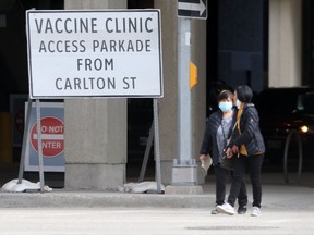 Activity near the RBC Convention Centre vaccination site, in Winnipeg on Saturday.