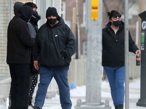 Foot traffic in Winnipeg on Tuesday, March 30, 2021.