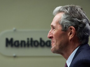 Premier of Manitoba Brian Pallister speaks at a news conference after the 2021 budget was delivered at the Manitoba Legislative Building in Winnipeg on Wednesday, April 7, 2021. THE CANADIAN PRESS/David Lipnowski