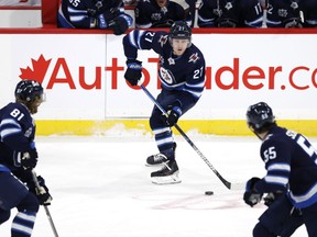 Central Division's Kyle Connor, of the Winnipeg Jets, left, and