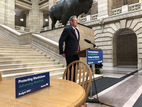 ﻿Premier Brian Pallister announces the province will follow through with the phase out of the education tax on property taxes beginning this year on Thursday at the Manitoba Legislature in Winnipeg.