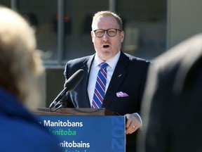 Finance Minister Scott Fielding speaks during a budget press conference outside Cadham Provincial Laboratory on William Avenue in Winnipeg on Tues., April 6, 2021. Kevin King/Winnipeg Sun/Postmedia Network